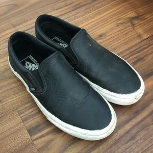 black leather slip on vans